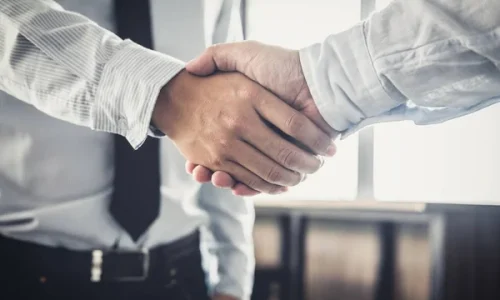 depositphotos_189046354-stock-photo-handshake-after-good-cooperation-two
